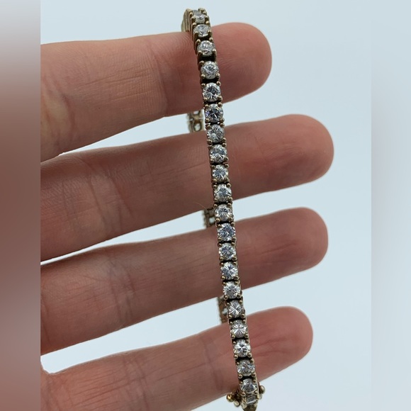Sterling Tennis Bracelet with Imitation Diamonds - Picture 1 of 4